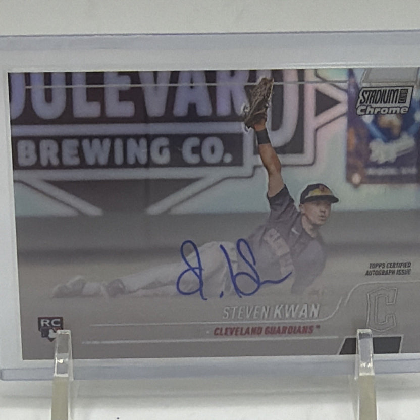 Close-up of Steven Kwan 2022 Stadium Club Chrome rookie card with blue on-card autograph