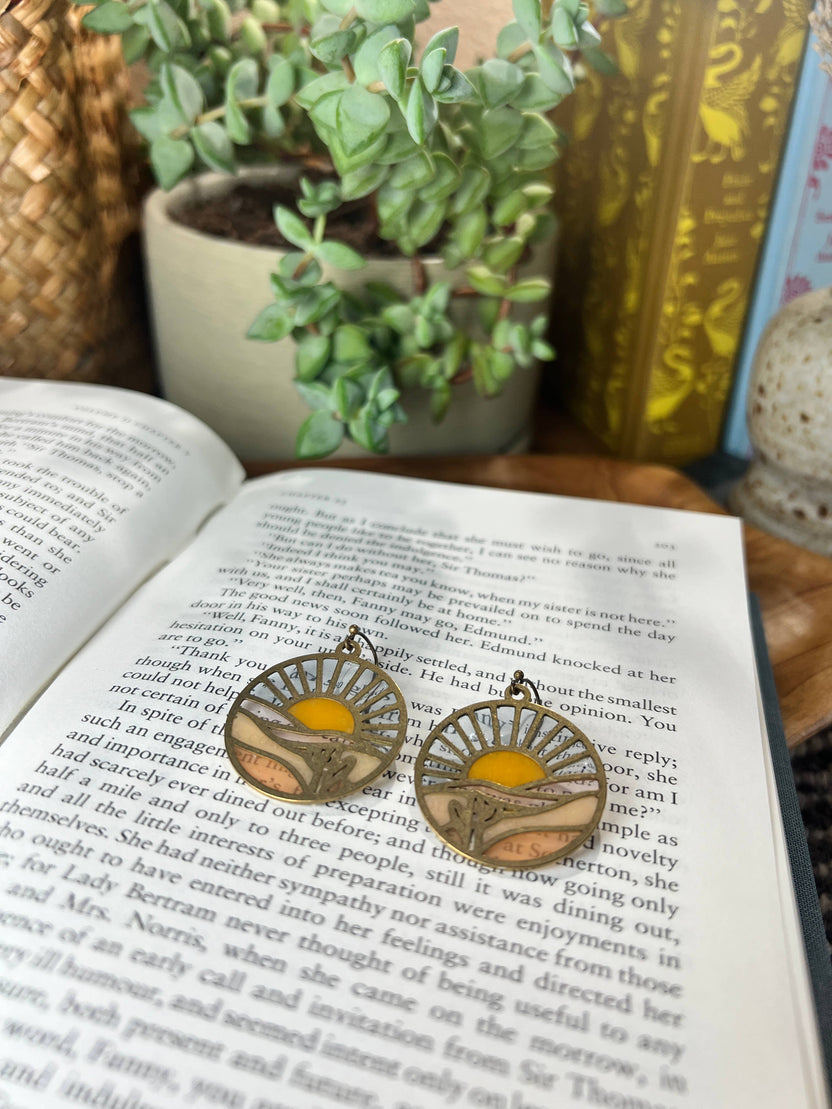 sunset earrings, stained glass resin earrings, brass sunset earrings, colorful statement earrings, nature inspired earrings, sunset landscape jewelry, handmade resin earrings, boho brass earrings, lightweight dangle earrings, artisan earrings for women, unique sunset jewelry, romantic gift for her, Rogue & Rye earrings, outdoor lover gift, handcrafted scenic earrings, resin stained glass jewelry, modern brass earrings, everyday nature earrings, sunset mountain earrings, warm toned earrings