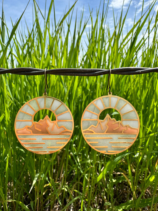 Glacier National Park earrings, Swiftcurrent earrings, stained glass resin earrings, nature-inspired jewelry, national park earrings, handcrafted scenic earrings, lightweight statement earrings, mountain landscape earrings, Rogue & Rye earrings, outdoor adventure jewelry, artisan resin earrings, brass dangle earrings, modern nature earrings, colorful scenic jewelry, gift for nature lovers, unique national park gift, handmade landscape earrings, resin art earrings, bold everyday earrings, wilderness inspired