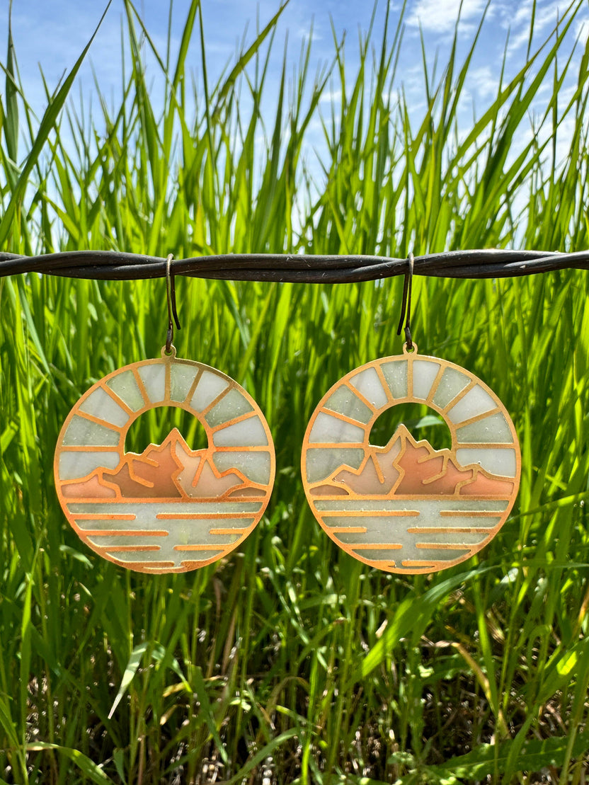 Glacier National Park earrings, Swiftcurrent earrings, stained glass resin earrings, nature-inspired jewelry, national park earrings, handcrafted scenic earrings, lightweight statement earrings, mountain landscape earrings, Rogue & Rye earrings, outdoor adventure jewelry, artisan resin earrings, brass dangle earrings, modern nature earrings, colorful scenic jewelry, gift for nature lovers, unique national park gift, handmade landscape earrings, resin art earrings, bold everyday earrings, wilderness inspired