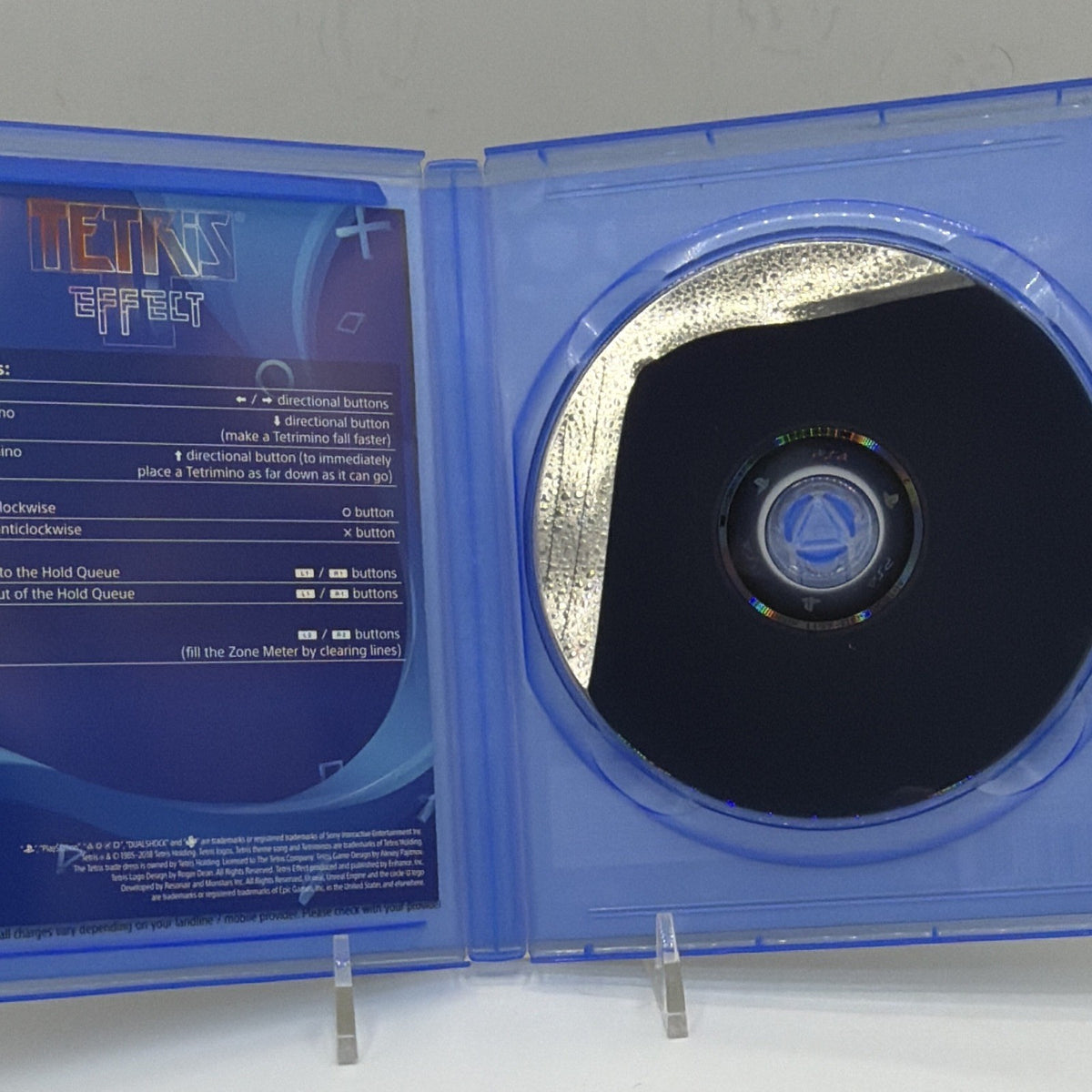 Tetris Effect PS4 game disc and included printed instruction insert inside original case