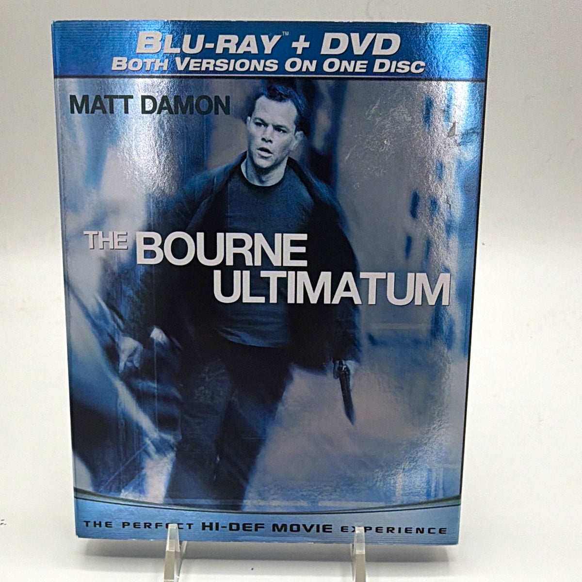 Front of pre-owned The Bourne Ultimatum Blu-ray + DVD edition starring Matt Damon
