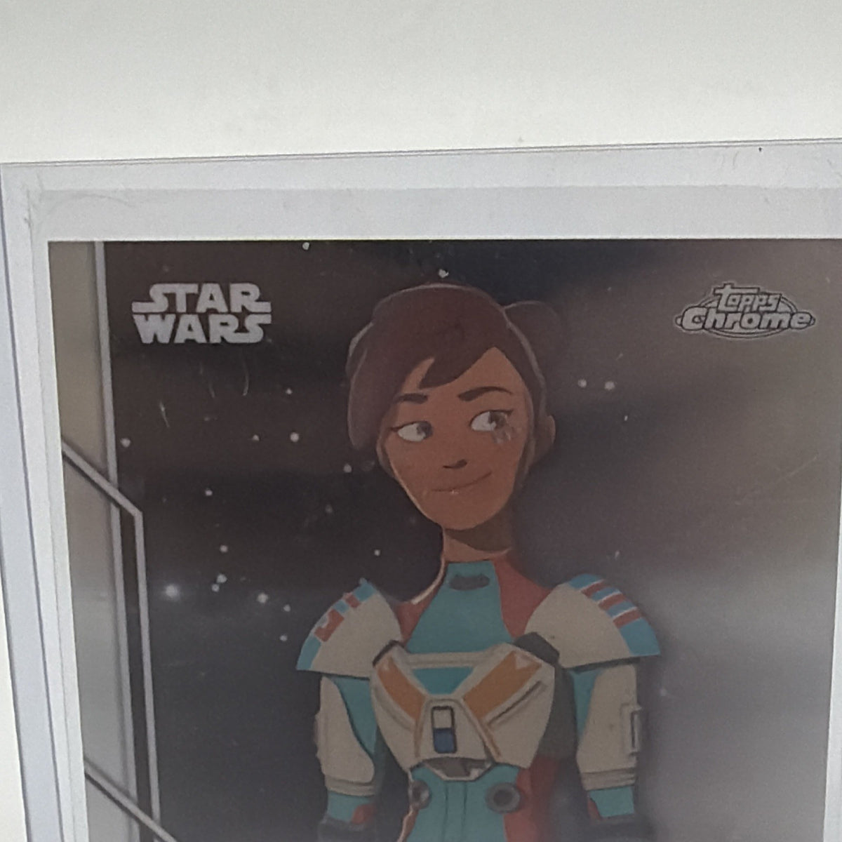 Detail of Myrna Velasco's blue autograph on Torra Doza Star Wars Resistance #41