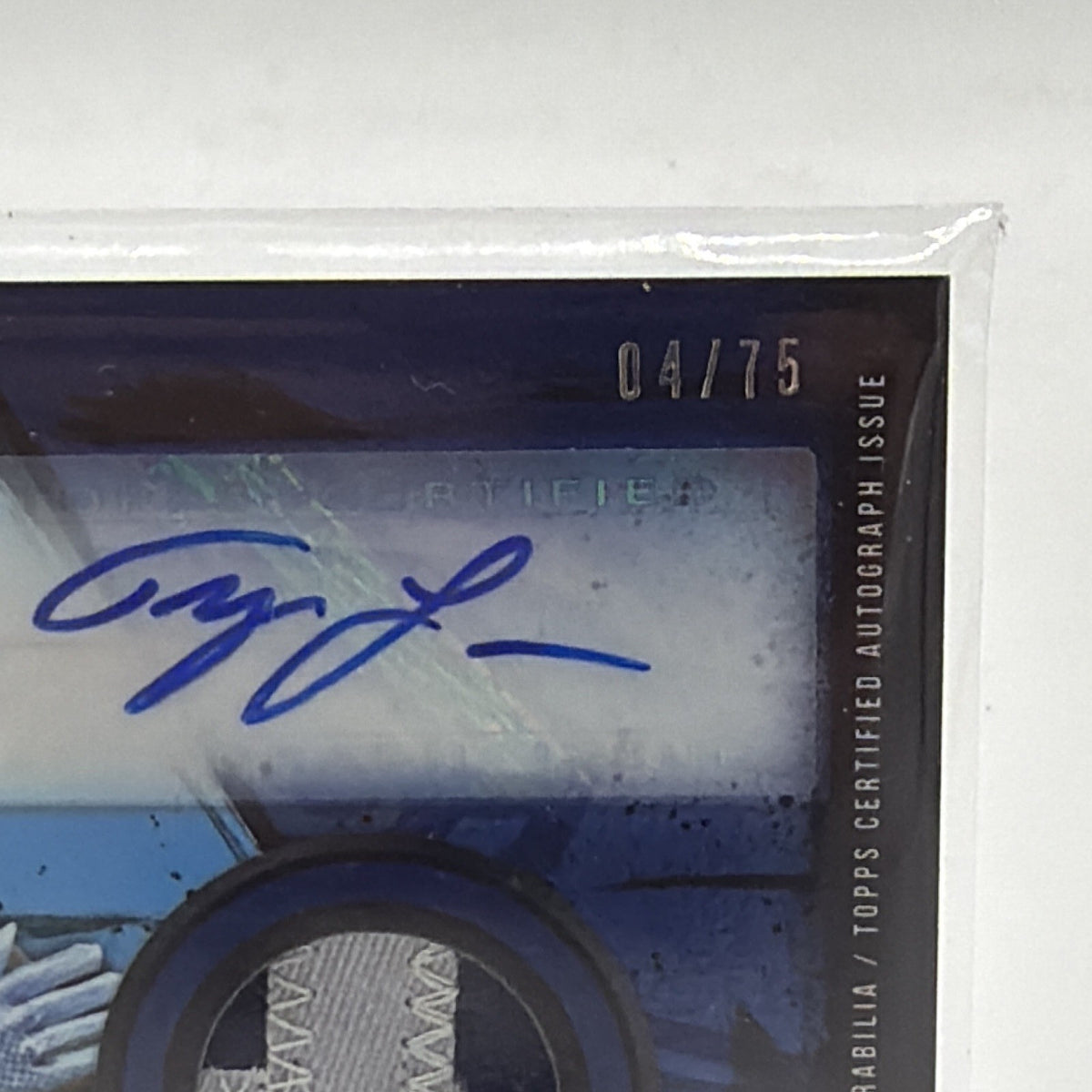Detail of Tyler Lockett Topps Fire rookie autograph patch showing serial number 04/75