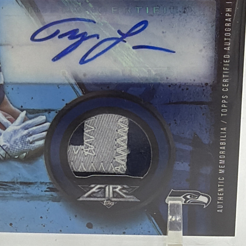 Close-up of the autograph and jersey relic on Tyler Lockett 2015 Topps Fire Blue rookie card