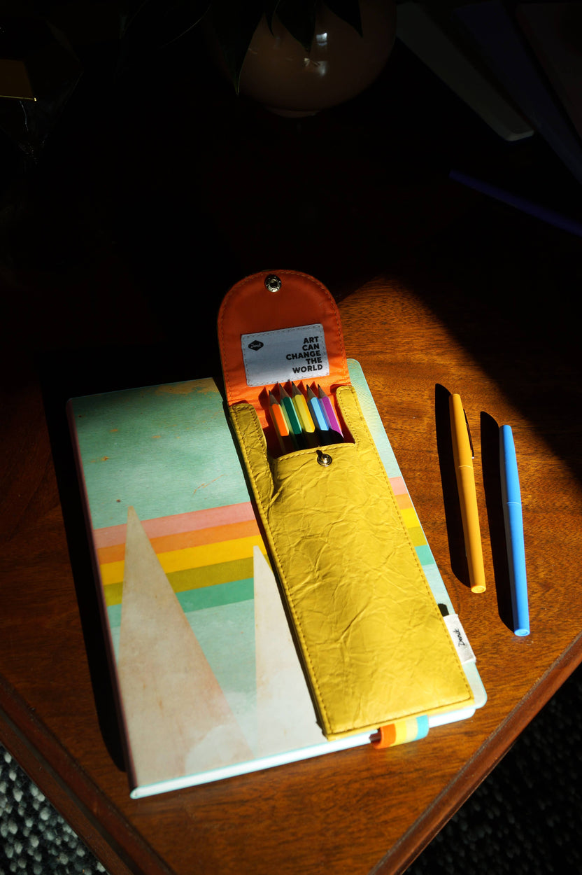 notebook pencil pouch, sketchbook accessory pouch, Denik notebook pouch, vegan leather art pouch, yellow elastic pencil holder, travel pencil case, pen pouch for artists, elastic sketchbook strap, journal storage pouch