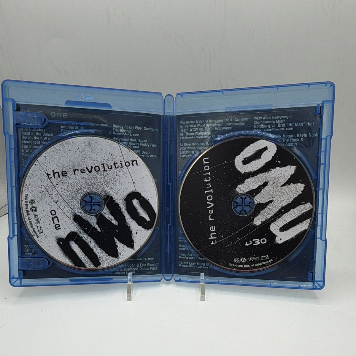 Open WWE nWo: The Revolution case showing both included Blu-ray discs