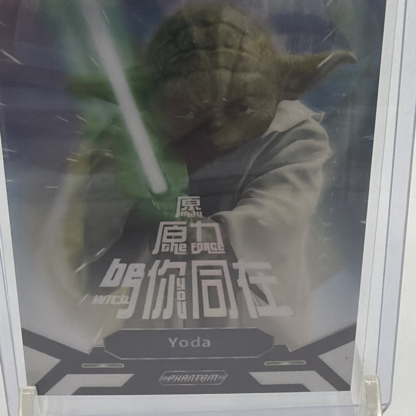 Close-up of Yoda with green lightsaber on Disney 100 Star Wars #PS-YL-12