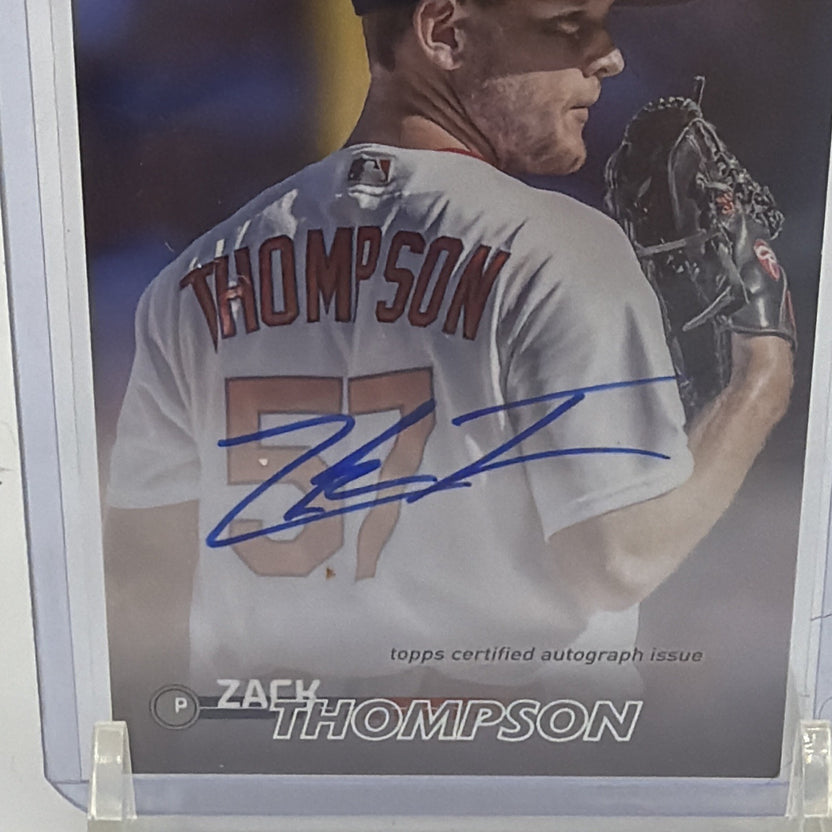 Angled close-up of Zack Thompson's blue-ink autograph on 2023 Stadium Club rookie card