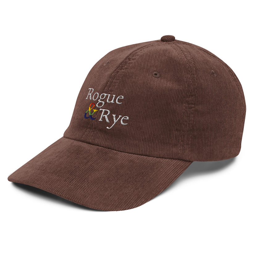 and pride hat, lgbtq corduroy cap, pride embroidered hat, queer and questioning cap, rogue and rye pride, inclusive pride apparel, outright international donation, and hat message, unstructured low profile cap, soft corduroy hat, queer pride gear, gender inclusive pride, thoughtful pride gift, adjustable pride cap, rogue and rye hat, embroidered message hat, live outside the binary, pride fashion statement, soft cotton pride hat