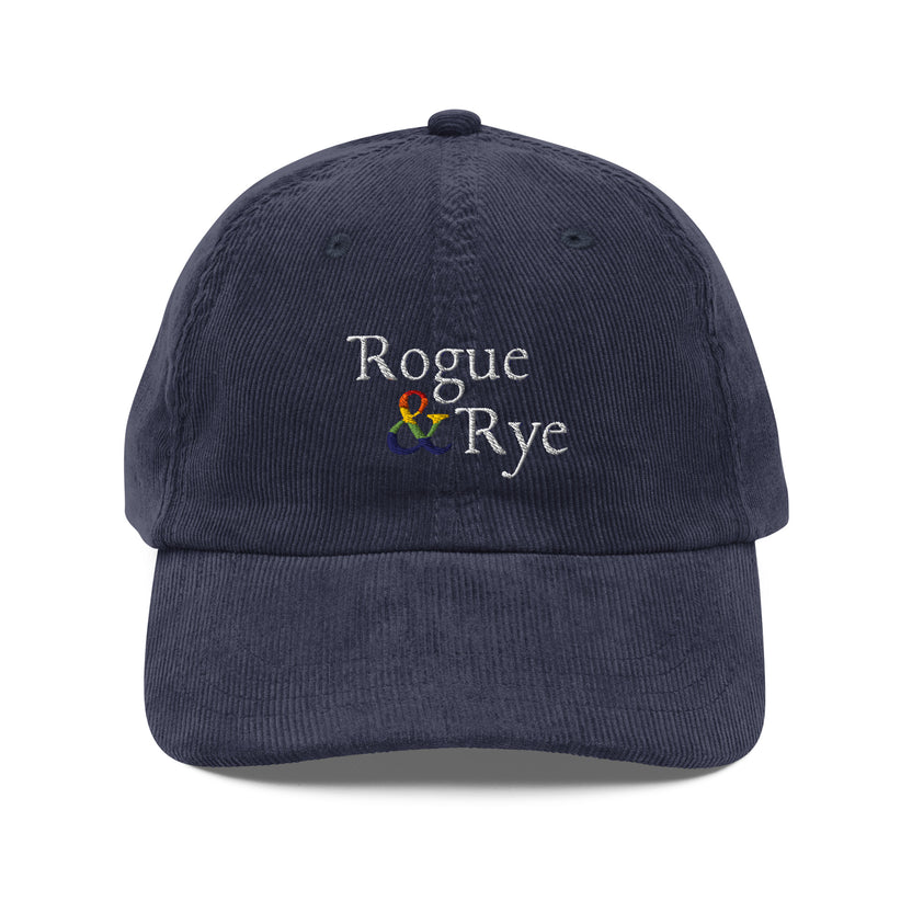 and pride hat, lgbtq corduroy cap, pride embroidered hat, queer and questioning cap, rogue and rye pride, inclusive pride apparel, outright international donation, and hat message, unstructured low profile cap, soft corduroy hat, queer pride gear, gender inclusive pride, thoughtful pride gift, adjustable pride cap, rogue and rye hat, embroidered message hat, live outside the binary, pride fashion statement, soft cotton pride hat