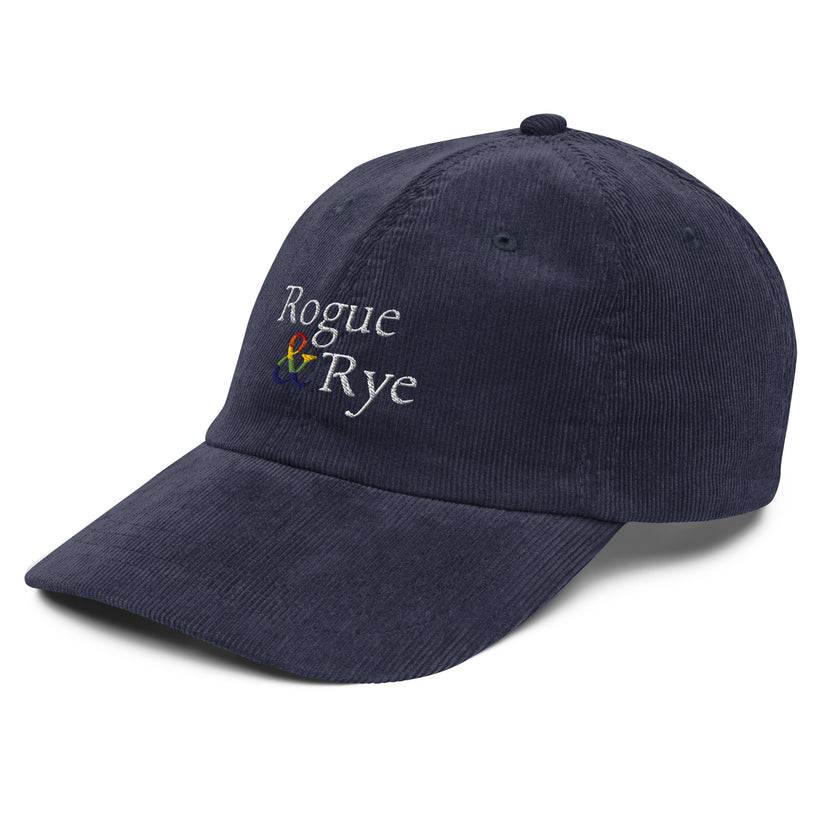 and pride hat, lgbtq corduroy cap, pride embroidered hat, queer and questioning cap, rogue and rye pride, inclusive pride apparel, outright international donation, and hat message, unstructured low profile cap, soft corduroy hat, queer pride gear, gender inclusive pride, thoughtful pride gift, adjustable pride cap, rogue and rye hat, embroidered message hat, live outside the binary, pride fashion statement, soft cotton pride hat