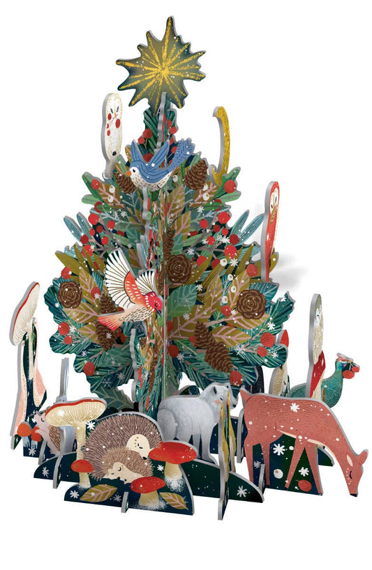 Antoana Oreski Beneath the Tree Pop & Slot Advent Calendar fully assembled into a three-dimensional Christmas tree surrounded by woodland animals, birds, mushrooms, and festive decorations.