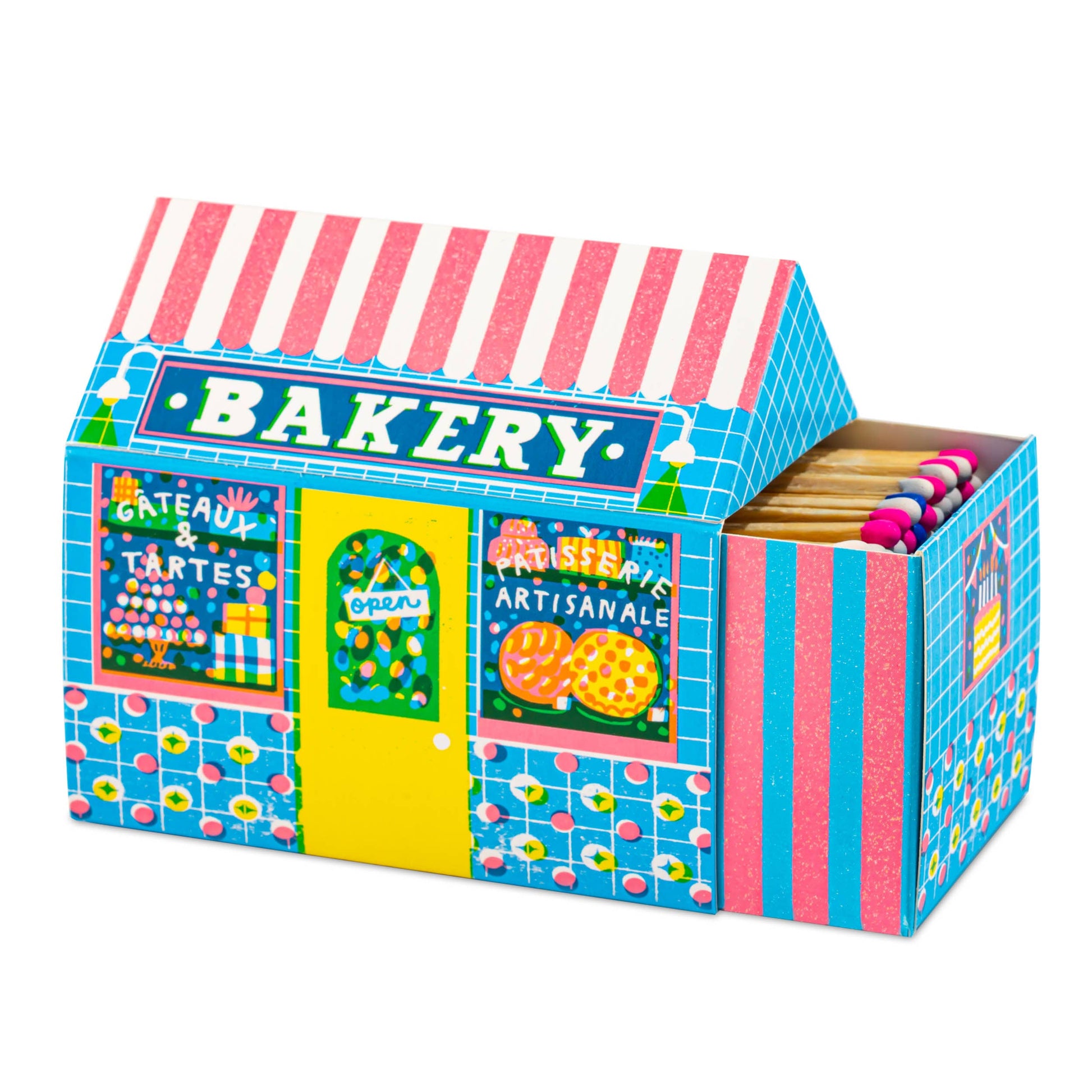Bakery House matchbox, house-shaped safety matches, The Printed Peanut illustration, bakery shopfront matchbox design, pastry-themed gifts, foodie gift ideas, Archivist House Match collection, whimsical illustrated matchbox, UK-made safety matches, kitchen décor accessories, collectible matchbox art, Rogue & Rye curated gifts, colorful bakery artwork, artisan matchboxes.