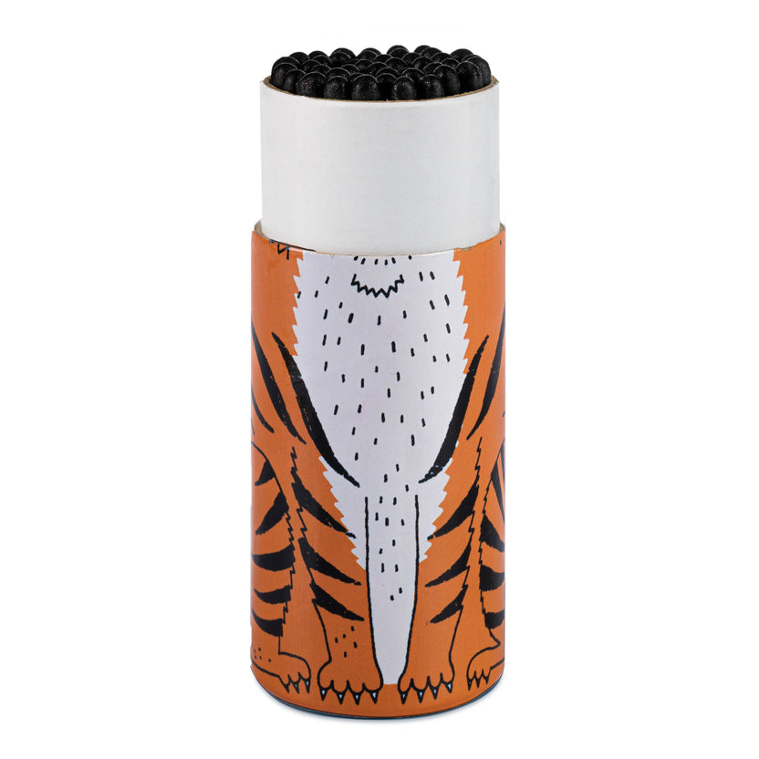 Archivist Tiger cylinder matches, Charlotte Farmer tiger illustration, wild animal match collection, artist-designed match tube, vibrant match cylinder, unique birthday gift idea, collectible match container, UK-made safety matches, whimsical matchbox art, colorful home decor accents, candle-lighting accessories, Rogue & Rye curated gifts, playful animal artwork, small-batch gifting ideas.