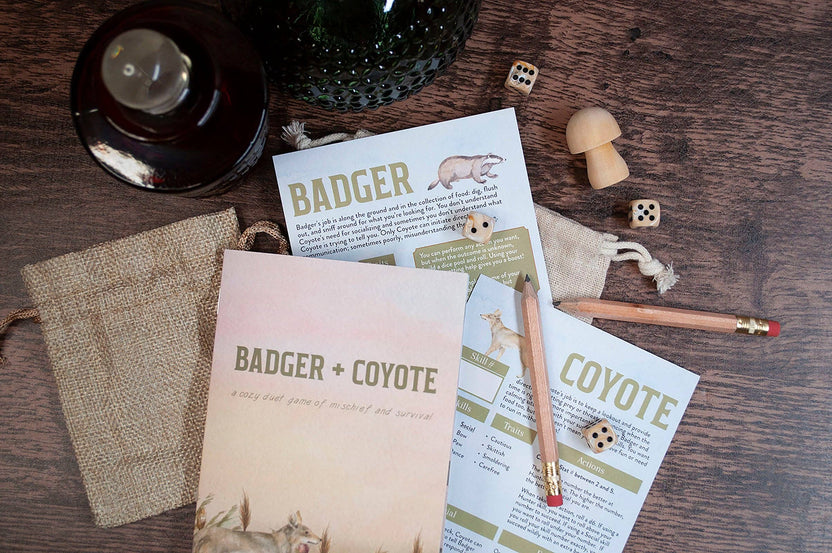 cozy 2-player RPG, animal tabletop roleplaying game, story-driven TTRPG, Badger and Coyote RPG, friendship adventure game, duet RPG book, forest fantasy RPG, heartwarming TTRPG, small press RPG zine, whimsical roleplaying game, narrative-driven RPG for two, A5 full color RPG, perfect bound story game, animal adventure tabletop, nature-themed RPG, storytelling game for friends, lighthearted tabletop RPG, two player adventure game, roleplaying game with animals, Rogue & Rye games