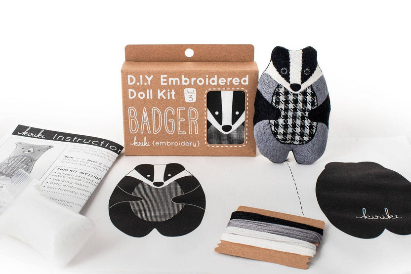 badger embroidery kit, embroidered doll craft kit, Kiriki Press embroidery, Level 3 embroidery pattern, animal embroidery project, hand embroidery for beginners, stitched badger plush, screen printed embroidery fabric, DMC floss kit, mindful stitching craft