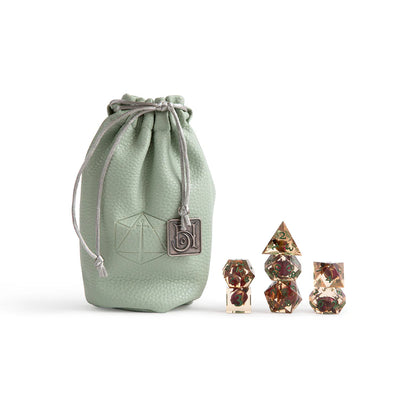 Fearne Calloway dice set, Critical Role Bells Hells dice, Exandria Unlimited dice, sharp-edged DnD dice, flower and gold leaf dice, Little Mister d20 icon, Ashley Johnson character dice, Bells Hells polyhedral dice, Critical Role official dice, fantasy resin dice set