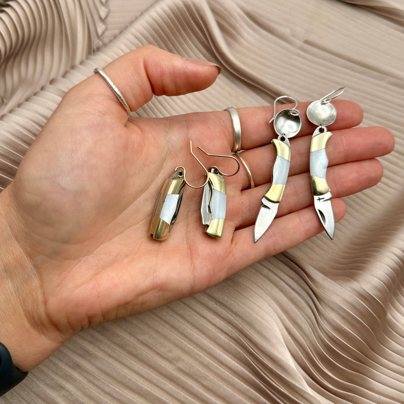 mini knife earrings, mother of pearl knife earrings, billie pocket knife earrings, silver mini blade earrings, functional knife earrings, edgy jewelry with blade, pocket knife earrings silver, dnd rogue fashion accessories, utility jewelry earrings, mother of pearl blade jewelry, tiny knife earrings real, sterling silver ear wire earrings, surprise statement earrings, fashion with a sharp twist, rebellious jewelry design