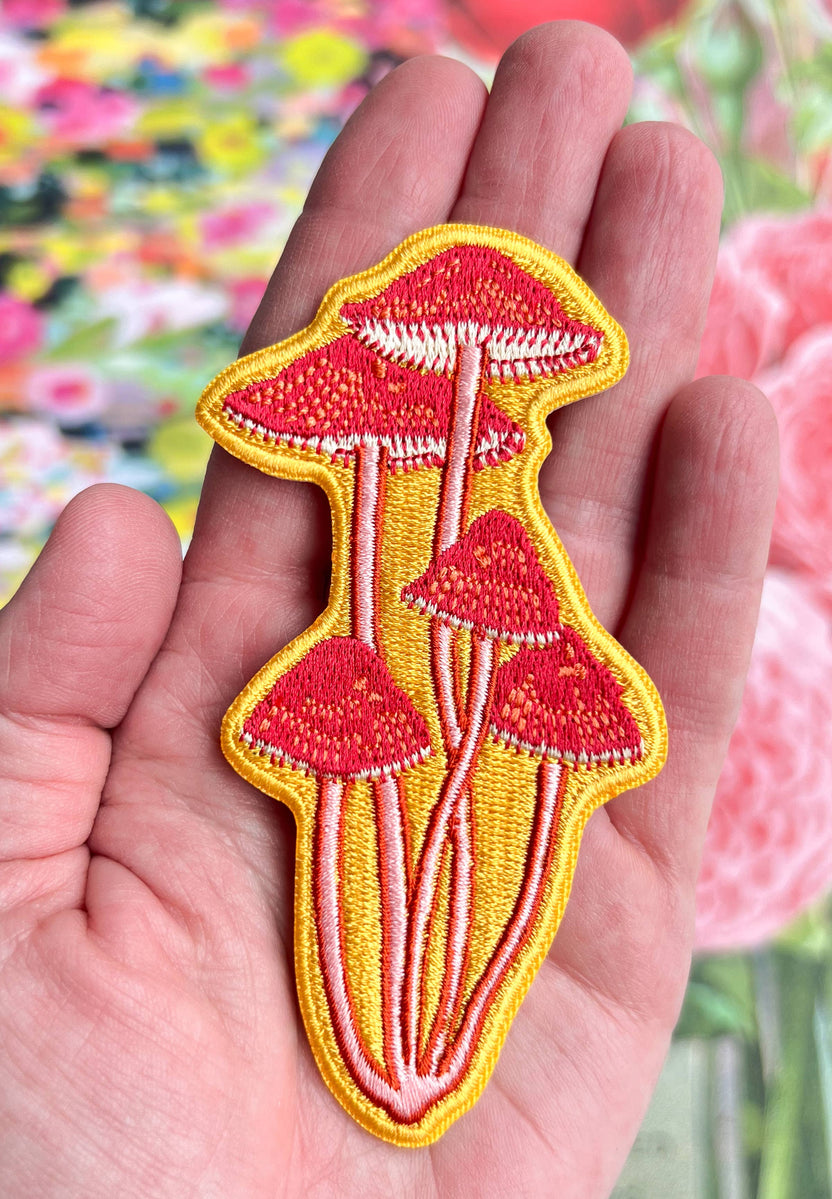 bonnet mushroom patch, embroidered mushroom patch, linocut mushroom illustration, Élise Lassonde art, mushroom iron-on patch, fungi sew-on patch, woodland embroidered patch, tall mushroom applique, backpack patch mushroom, cottagecore mushroom accessory, artisan embroidered patch, blackbird letterpress patch, nature lover gift, rogue & rye mushroom collection, embroidered bonnet mushroom