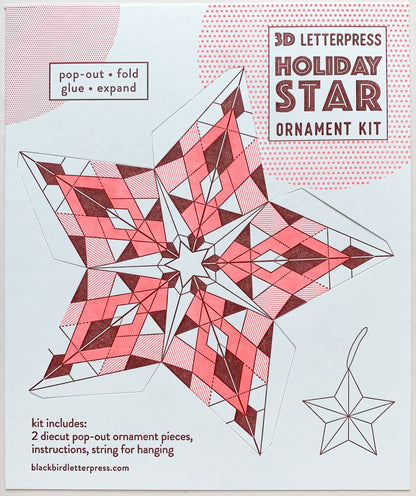 geometric holiday star kit, diy star ornament, neon red letterpress ornament, holiday paper craft kit, christmas diy craft, blackbird letterpress ornament kit, recycled white paper craft, pop-out star ornament, modern holiday décor, fold and glue ornament, handmade holiday craft kit, seasonal crafting project, vibrant holiday ornament, rogue & rye craft collection, 3d paper star ornament