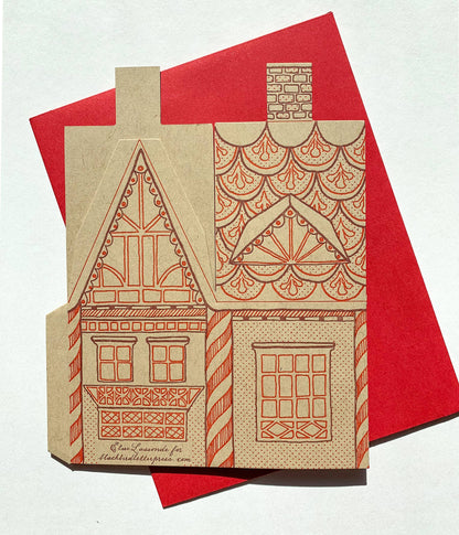 gingerbread house card, holiday 3D house card, letterpress gingerbread card, foldable gingerbread house, kraft paper letterpress, die-cut Christmas card, buildable holiday card, miniature gingerbread house, festive letterpress stationery, artisan holiday card, displayable greeting card, holiday keepsake card, Blackbird Letterpress holiday collection, Rogue & Rye holiday cards, A2 Christmas card, Élise Lassonde illustration, paper craft gingerbread house