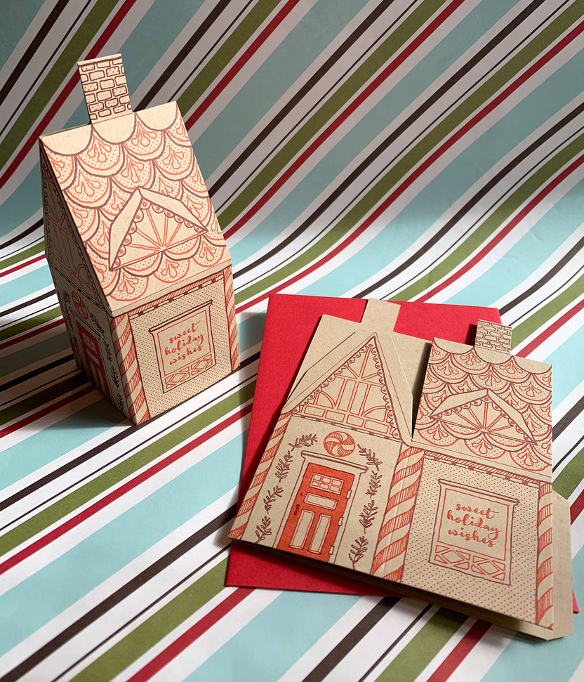 gingerbread house card, holiday 3D house card, letterpress gingerbread card, foldable gingerbread house, kraft paper letterpress, die-cut Christmas card, buildable holiday card, miniature gingerbread house, festive letterpress stationery, artisan holiday card, displayable greeting card, holiday keepsake card, Blackbird Letterpress holiday collection, Rogue & Rye holiday cards, A2 Christmas card, Élise Lassonde illustration, paper craft gingerbread house