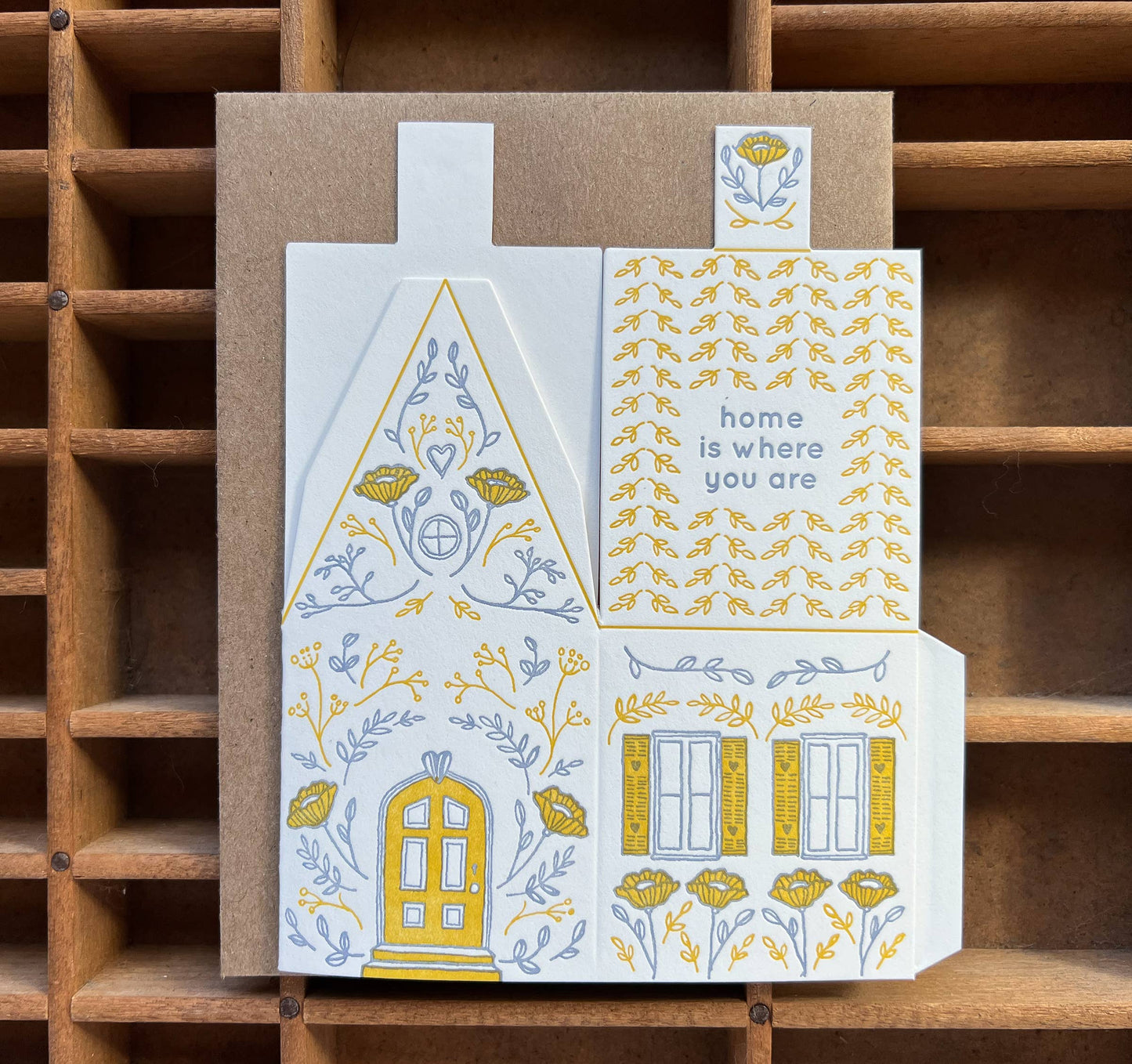 home is where you are card, 3D house card, letterpress house card, foldable house card, die-cut letterpress card, buildable paper house, mustard lavender letterpress, cotton paper card, keepsake house card, miniature house card, new home card, moving announcement card, housewarming stationery, Blackbird Letterpress card, artisan letterpress stationery, displayable greeting card, paper craft card, Rogue & Rye letterpress collection, A2 letterpress card