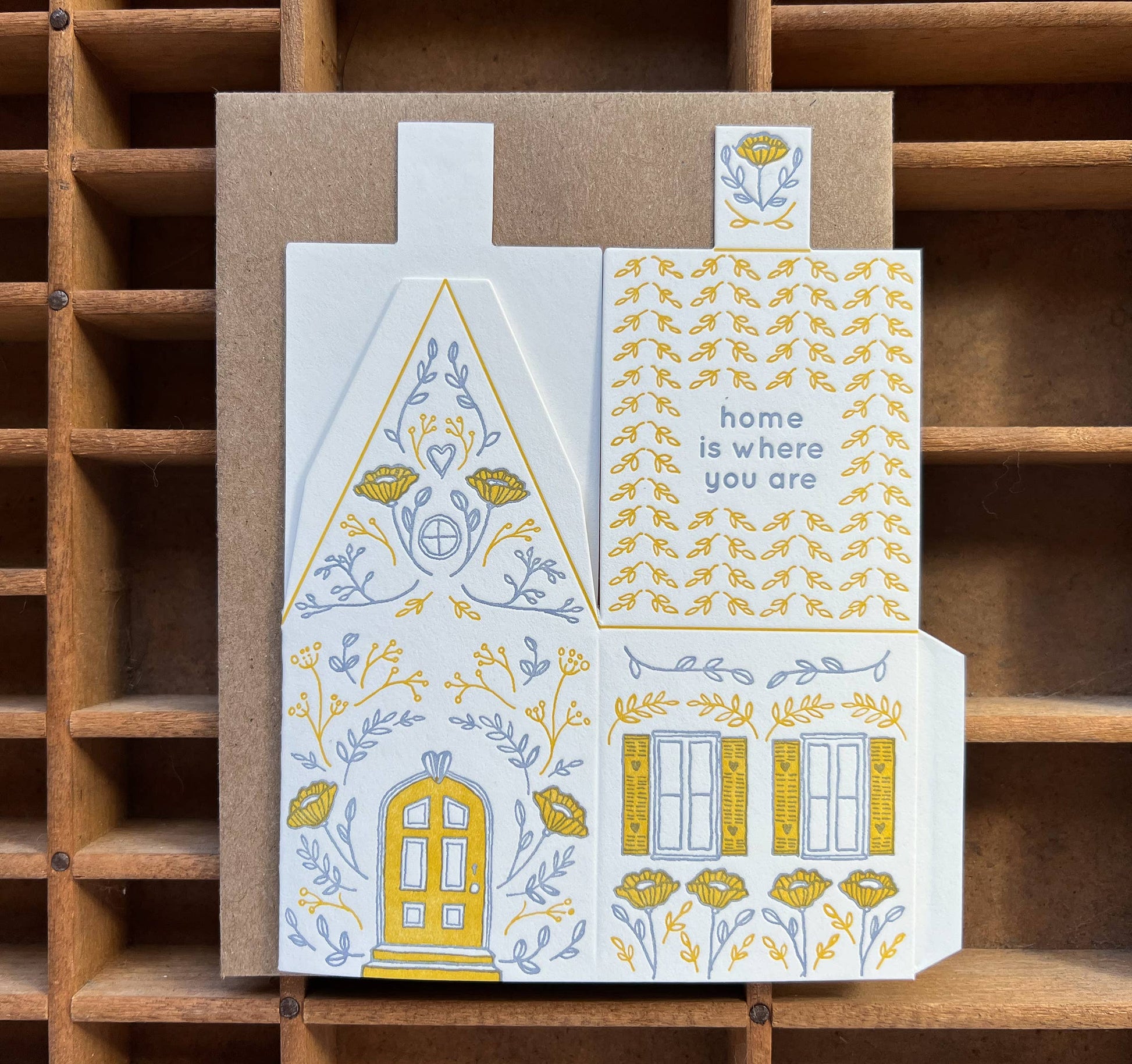 home is where you are card, 3D house card, letterpress house card, foldable house card, die-cut letterpress card, buildable paper house, mustard lavender letterpress, cotton paper card, keepsake house card, miniature house card, new home card, moving announcement card, housewarming stationery, Blackbird Letterpress card, artisan letterpress stationery, displayable greeting card, paper craft card, Rogue & Rye letterpress collection, A2 letterpress card