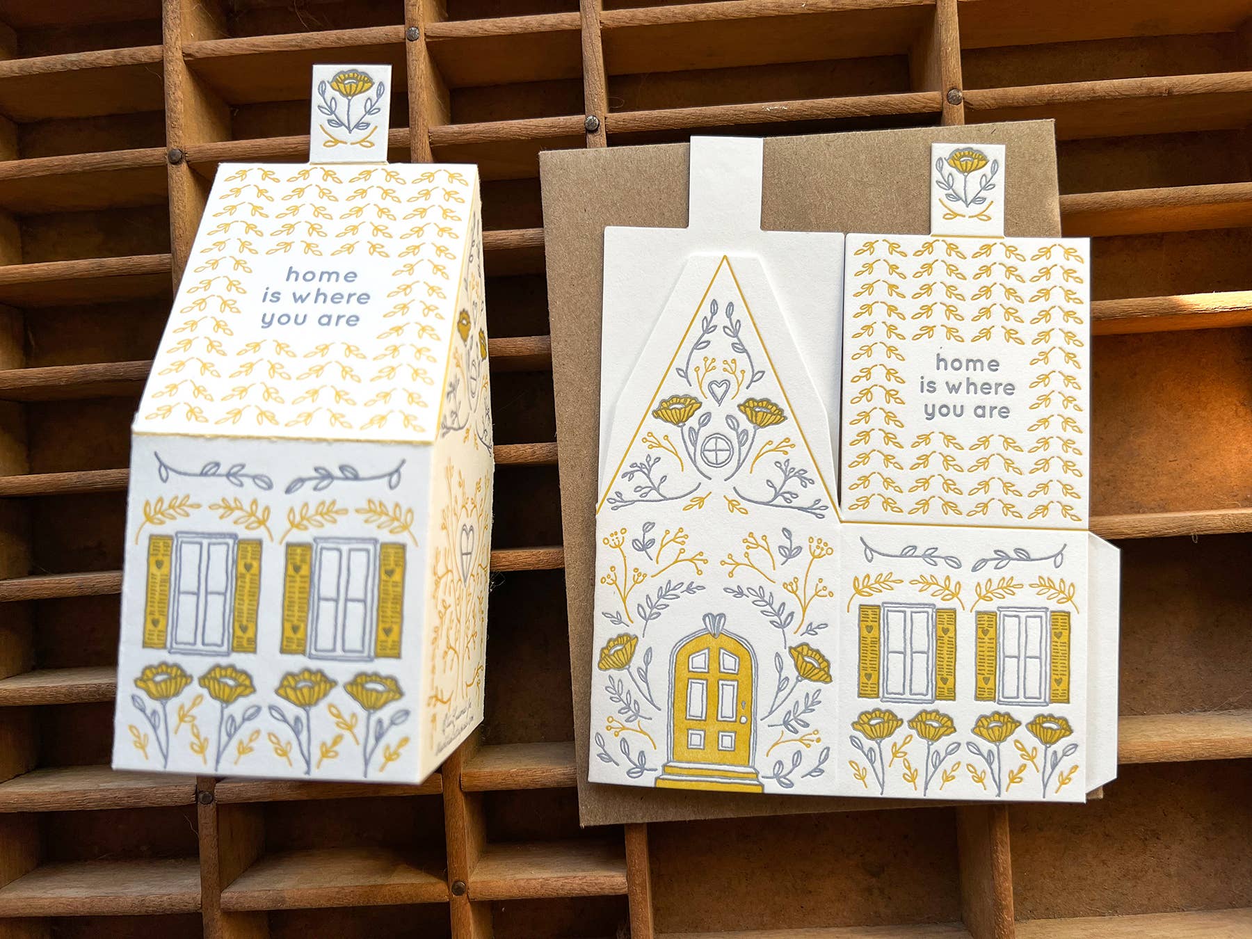 home is where you are card, 3D house card, letterpress house card, foldable house card, die-cut letterpress card, buildable paper house, mustard lavender letterpress, cotton paper card, keepsake house card, miniature house card, new home card, moving announcement card, housewarming stationery, Blackbird Letterpress card, artisan letterpress stationery, displayable greeting card, paper craft card, Rogue & Rye letterpress collection, A2 letterpress card