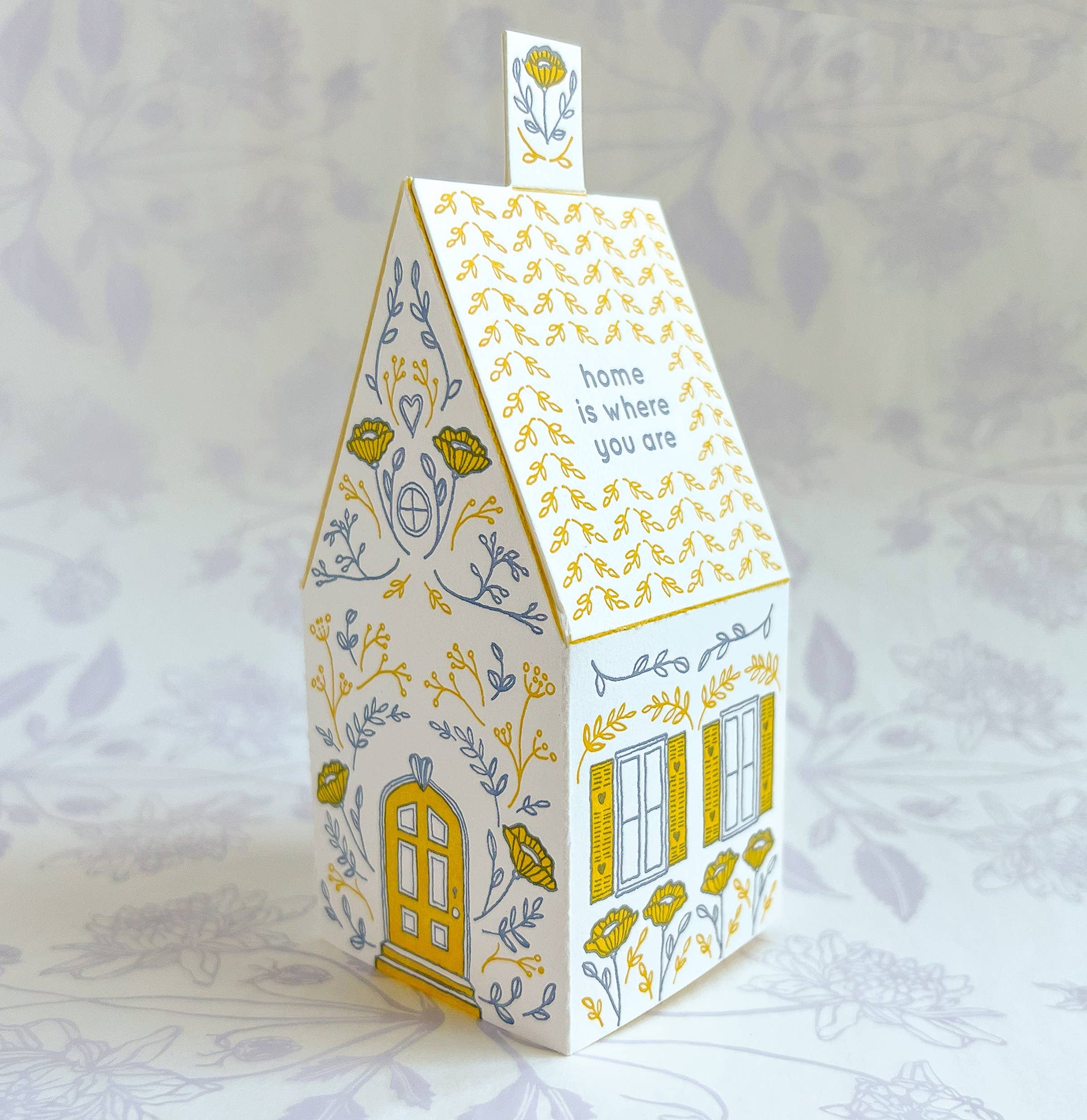 home is where you are card, 3D house card, letterpress house card, foldable house card, die-cut letterpress card, buildable paper house, mustard lavender letterpress, cotton paper card, keepsake house card, miniature house card, new home card, moving announcement card, housewarming stationery, Blackbird Letterpress card, artisan letterpress stationery, displayable greeting card, paper craft card, Rogue & Rye letterpress collection, A2 letterpress card