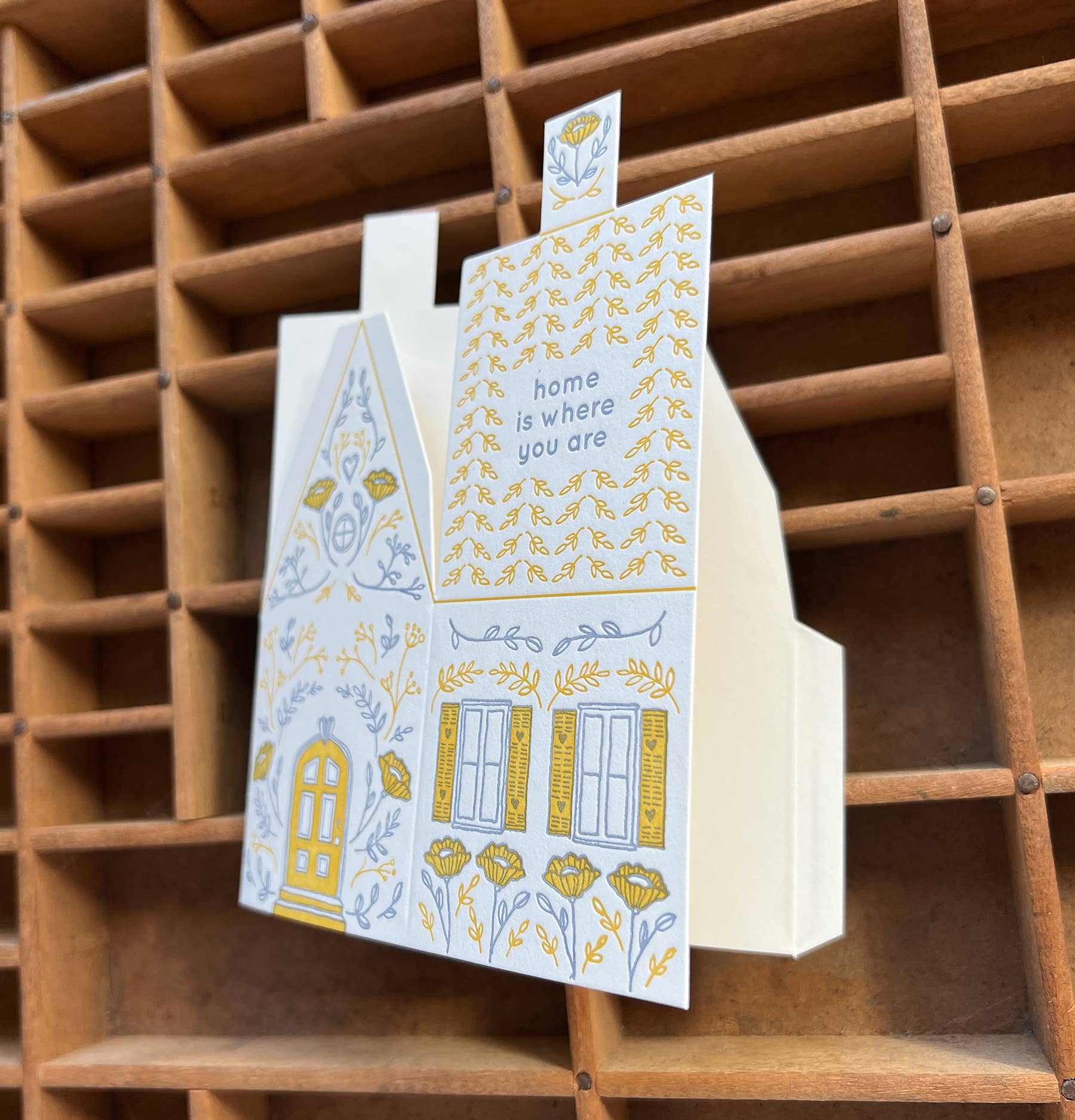 home is where you are card, 3D house card, letterpress house card, foldable house card, die-cut letterpress card, buildable paper house, mustard lavender letterpress, cotton paper card, keepsake house card, miniature house card, new home card, moving announcement card, housewarming stationery, Blackbird Letterpress card, artisan letterpress stationery, displayable greeting card, paper craft card, Rogue & Rye letterpress collection, A2 letterpress card