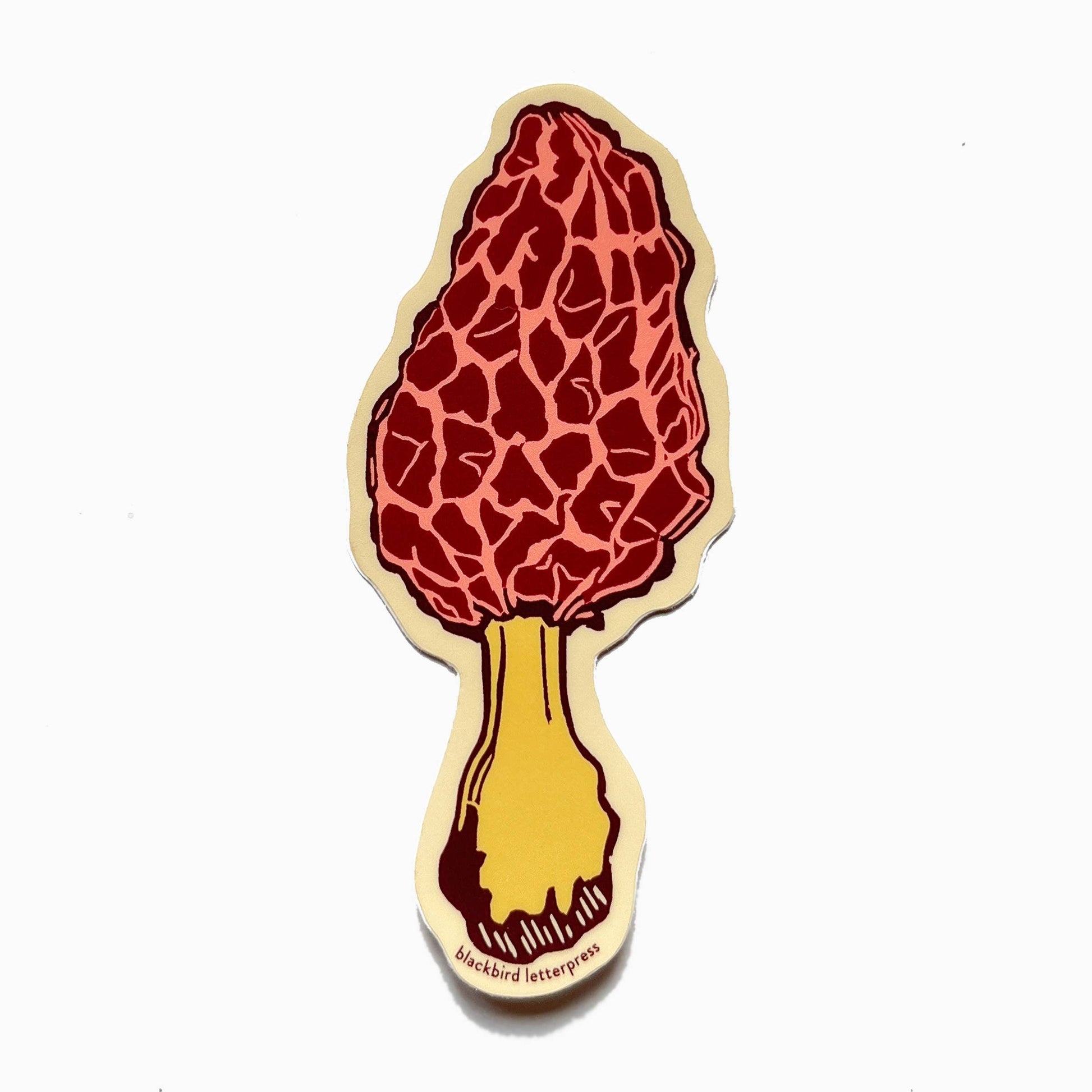 morel mushroom sticker, morel vinyl sticker, linocut mushroom illustration, Élise Lassonde artwork, Blackbird Letterpress sticker, matte vinyl die-cut sticker, waterproof mushroom sticker, weatherproof vinyl decal, forager gift, morel fungi art, botanical mushroom sticker, durable laptop sticker, water bottle decal, artisan paper goods, mushroom foraging art, small-batch maker sticker, Rogue & Rye sticker collection, woodland mushroom illustration, made in USA vinyl sticker
