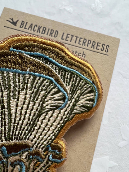 oyster mushroom patch, embroidered mushroom patch, fungi iron-on patch, mushroom sew-on patch, woodland embroidery patch, textured mushroom applique, backpack mushroom patch, jean jacket patch, nature lover gift, artisan embroidered patch, blackbird letterpress patch, fungi fashion accessory, cottagecore mushroom patch, rogue & rye patch collection, embroidered oyster mushroom