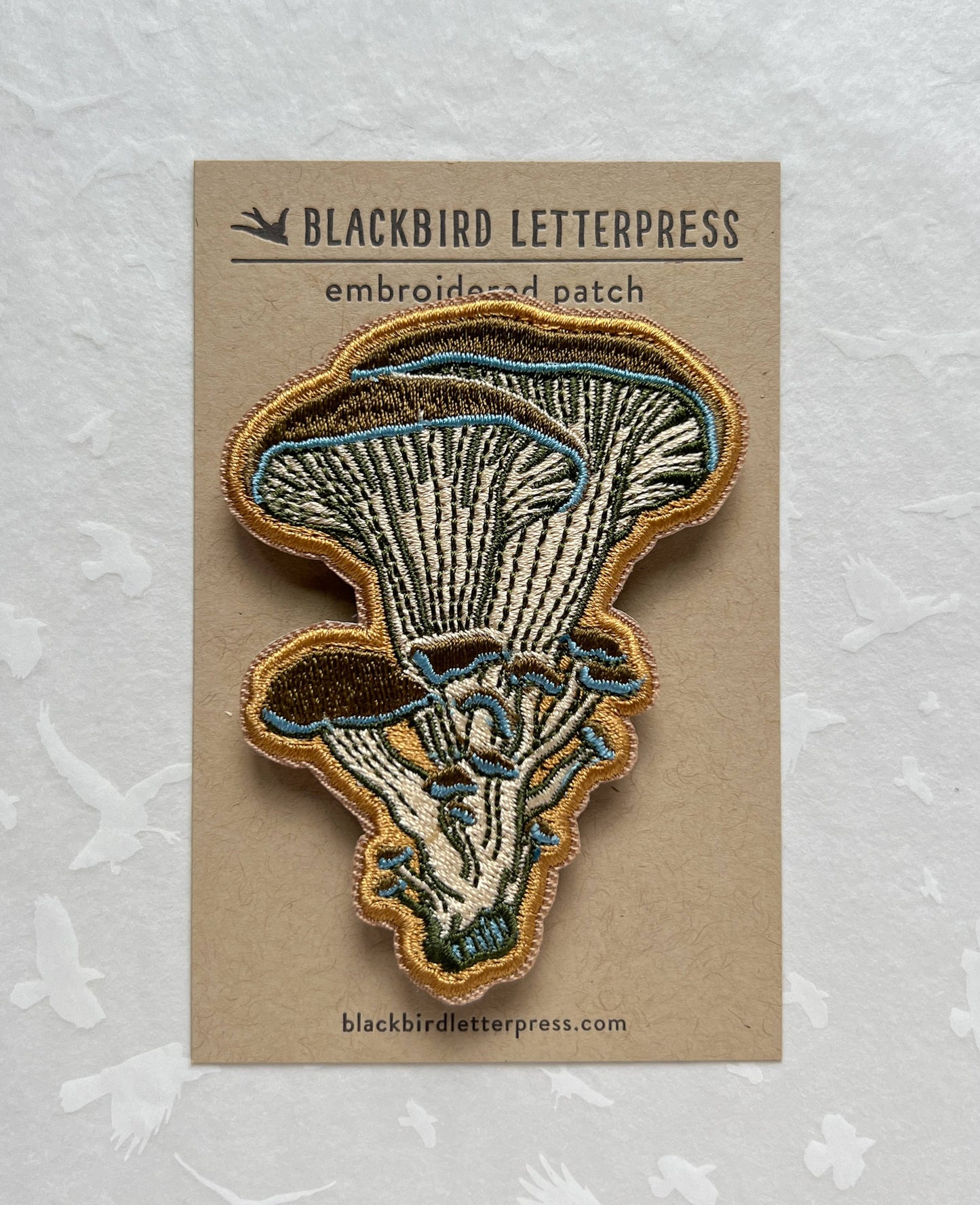 oyster mushroom patch, embroidered mushroom patch, fungi iron-on patch, mushroom sew-on patch, woodland embroidery patch, textured mushroom applique, backpack mushroom patch, jean jacket patch, nature lover gift, artisan embroidered patch, blackbird letterpress patch, fungi fashion accessory, cottagecore mushroom patch, rogue & rye patch collection, embroidered oyster mushroom