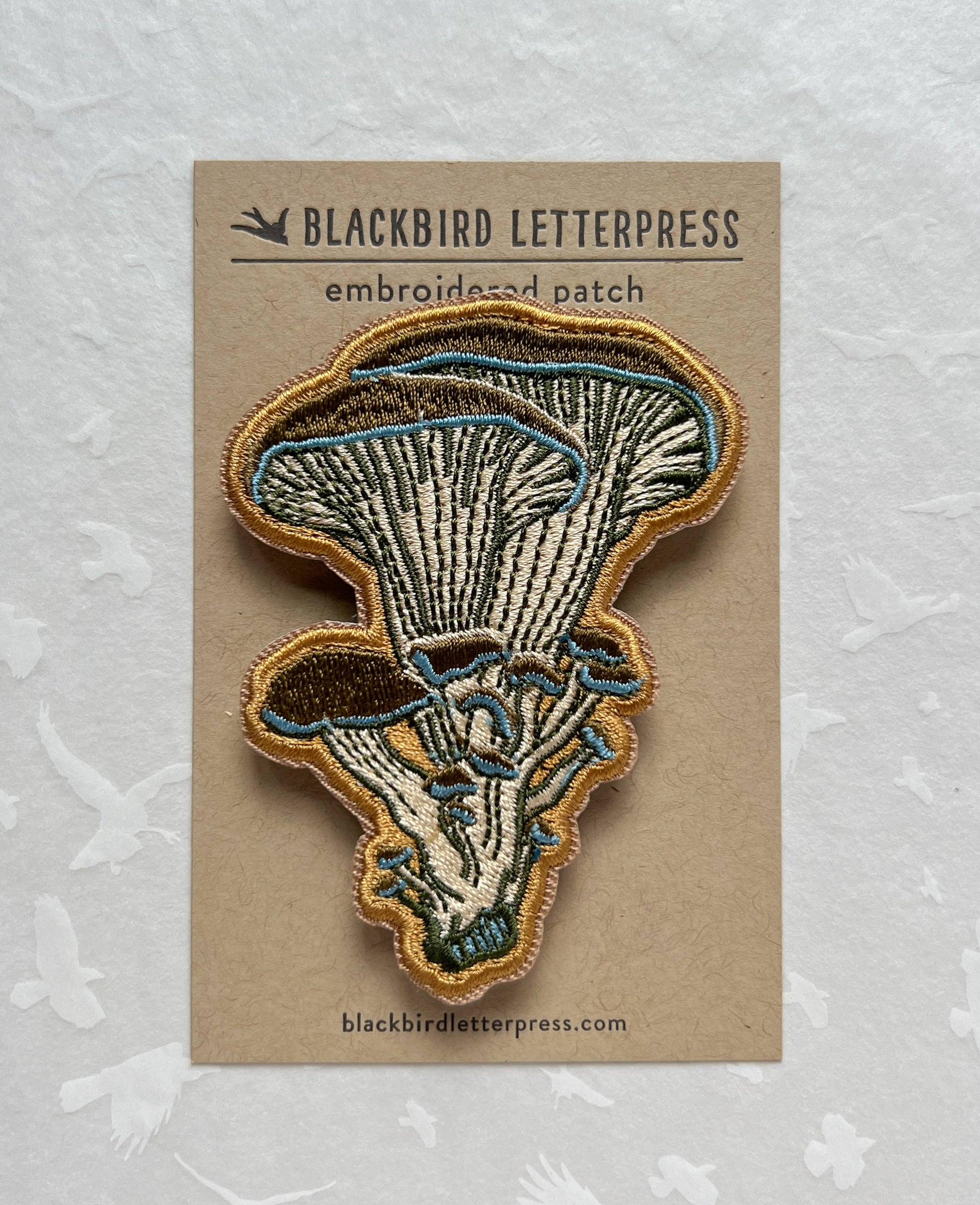oyster mushroom patch, embroidered mushroom patch, fungi iron-on patch, mushroom sew-on patch, woodland embroidery patch, textured mushroom applique, backpack mushroom patch, jean jacket patch, nature lover gift, artisan embroidered patch, blackbird letterpress patch, fungi fashion accessory, cottagecore mushroom patch, rogue & rye patch collection, embroidered oyster mushroom