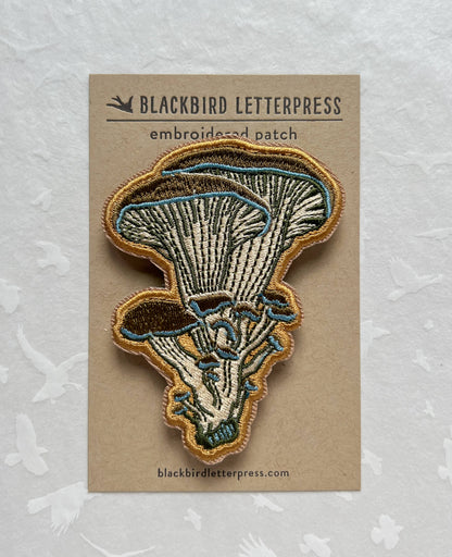 oyster mushroom patch, embroidered mushroom patch, fungi iron-on patch, mushroom sew-on patch, woodland embroidery patch, textured mushroom applique, backpack mushroom patch, jean jacket patch, nature lover gift, artisan embroidered patch, blackbird letterpress patch, fungi fashion accessory, cottagecore mushroom patch, rogue & rye patch collection, embroidered oyster mushroom