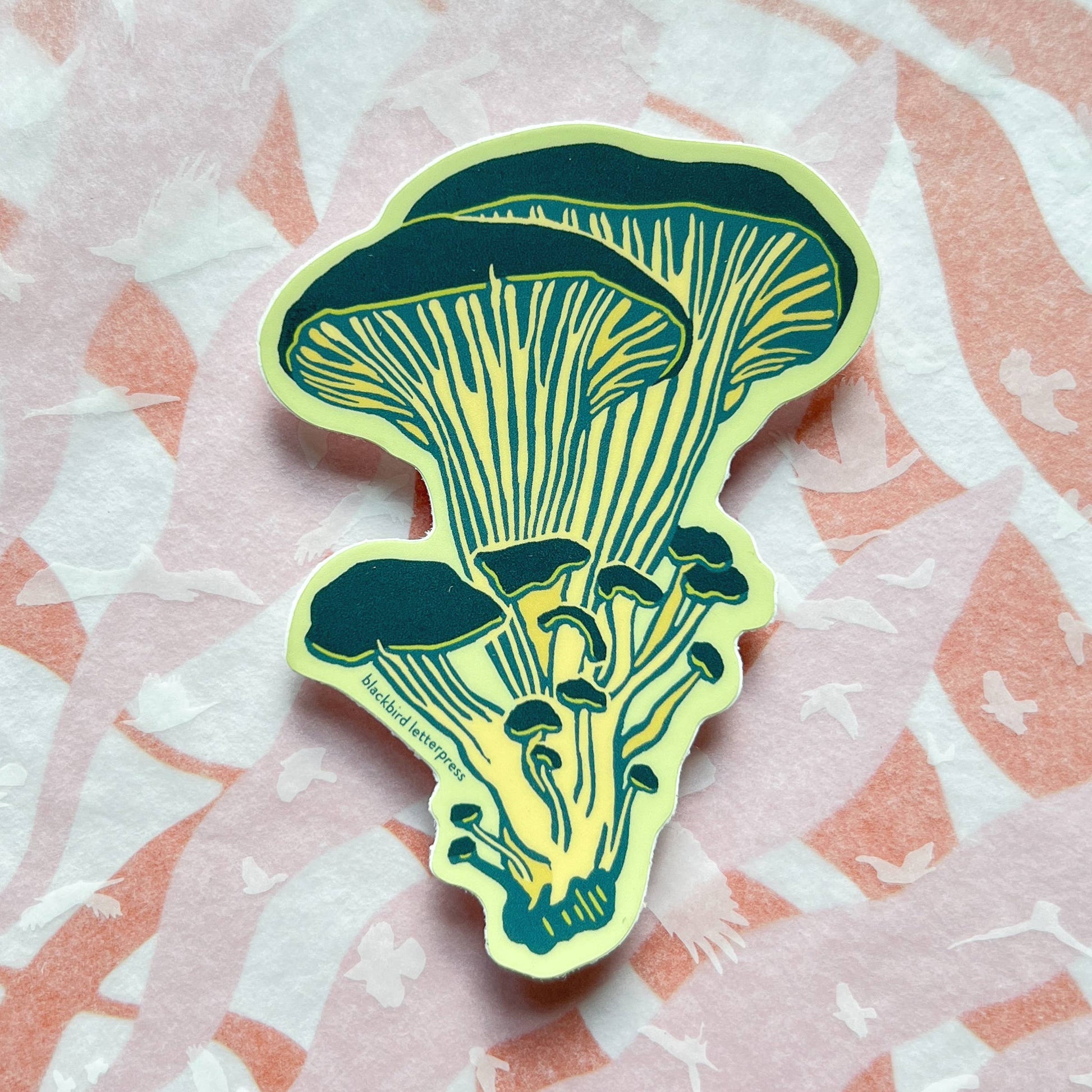 oyster mushroom sticker, mushroom vinyl sticker, linocut mushroom illustration, Élise Lassonde artwork, Blackbird Letterpress sticker, matte vinyl die-cut sticker, waterproof mushroom sticker, weatherproof uv-protected sticker, fungi lover decal, botanical mushroom art, forest mushroom sticker, durable laptop decal, water bottle sticker, artisan stationery sticker, handmade illustration sticker, small-batch maker, Rogue & Rye sticker collection, oyster fungi art, made in USA vinyl sticker