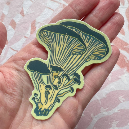 oyster mushroom sticker, mushroom vinyl sticker, linocut mushroom illustration, Élise Lassonde artwork, Blackbird Letterpress sticker, matte vinyl die-cut sticker, waterproof mushroom sticker, weatherproof uv-protected sticker, fungi lover decal, botanical mushroom art, forest mushroom sticker, durable laptop decal, water bottle sticker, artisan stationery sticker, handmade illustration sticker, small-batch maker, Rogue & Rye sticker collection, oyster fungi art, made in USA vinyl sticker