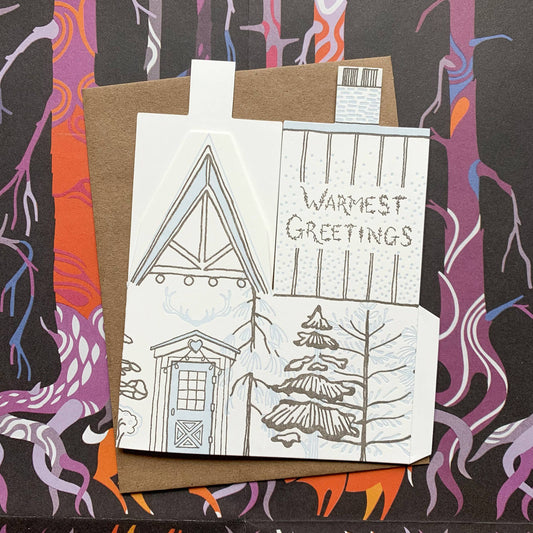 warmest greetings card, holiday cabin card, 3d house holiday card, winter cabin letterpress card, ice blue letterpress, forest brown letterpress, foldable holiday house card, buildable cabin card, die-cut Christmas card, miniature cabin card, artisan holiday stationery, Blackbird Letterpress holiday collection, Rogue & Rye holiday cards, winter greeting card, displayable paper craft card, Élise Lassonde illustration, A2 letterpress Christmas card