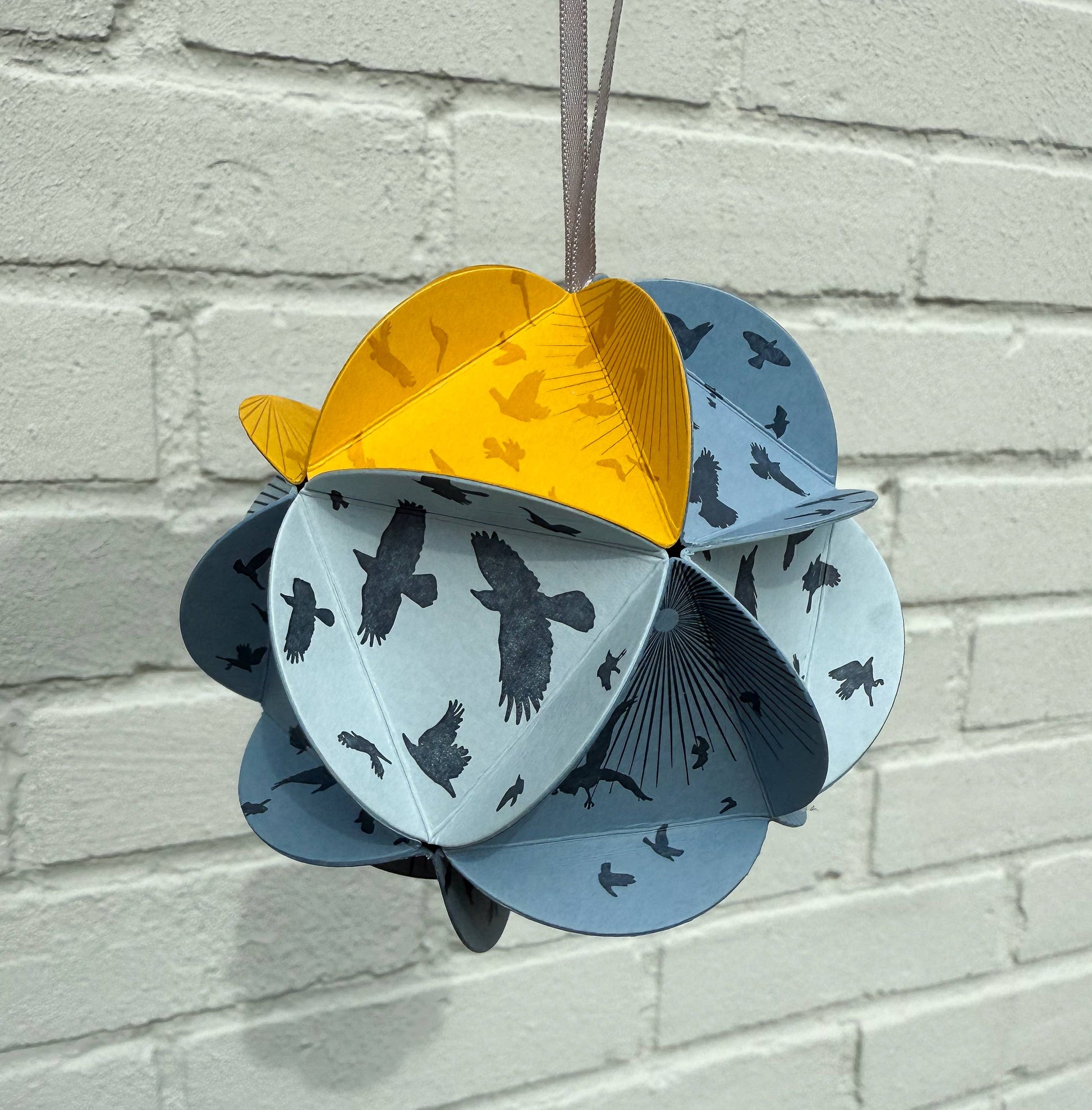 icosahedron ornament kit, diy paper ornament, winter solstice craft kit, letterpress ornament circles, geometric paper craft, holiday diy kit, blackbird letterpress kit, winter craft for kids and adults, paper ornament project, celestial ornament craft, 3d paper ornament kit, gift topper idea, handmade holiday craft, winter solstice decoration, rogue & rye craft kits, letterpress diy project, mindful crafting gift