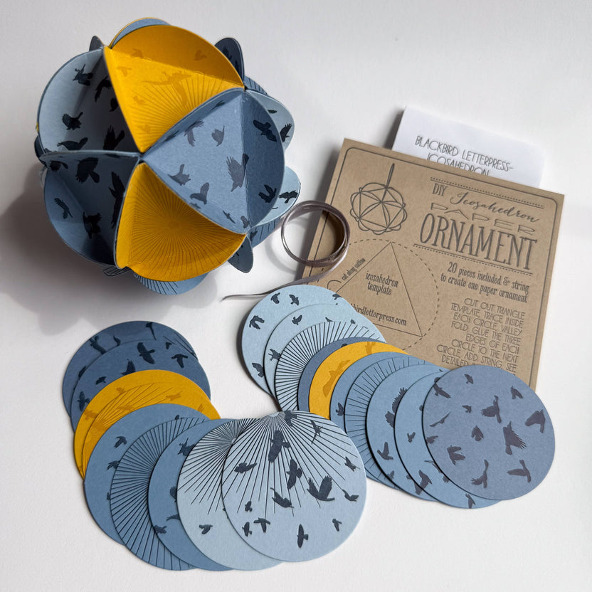 icosahedron ornament kit, diy paper ornament, winter solstice craft kit, letterpress ornament circles, geometric paper craft, holiday diy kit, blackbird letterpress kit, winter craft for kids and adults, paper ornament project, celestial ornament craft, 3d paper ornament kit, gift topper idea, handmade holiday craft, winter solstice decoration, rogue & rye craft kits, letterpress diy project, mindful crafting gift
