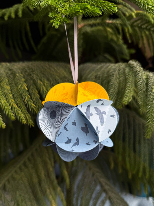 icosahedron ornament kit, diy paper ornament, winter solstice craft kit, letterpress ornament circles, geometric paper craft, holiday diy kit, blackbird letterpress kit, winter craft for kids and adults, paper ornament project, celestial ornament craft, 3d paper ornament kit, gift topper idea, handmade holiday craft, winter solstice decoration, rogue & rye craft kits, letterpress diy project, mindful crafting gift