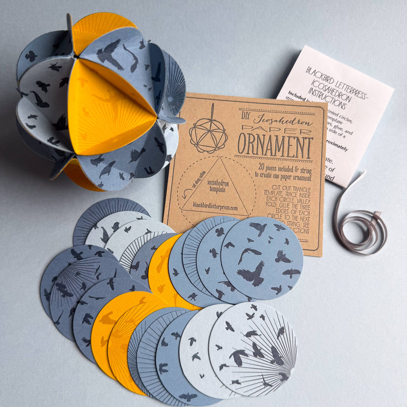 icosahedron ornament kit, diy paper ornament, winter solstice craft kit, letterpress ornament circles, geometric paper craft, holiday diy kit, blackbird letterpress kit, winter craft for kids and adults, paper ornament project, celestial ornament craft, 3d paper ornament kit, gift topper idea, handmade holiday craft, winter solstice decoration, rogue & rye craft kits, letterpress diy project, mindful crafting gift