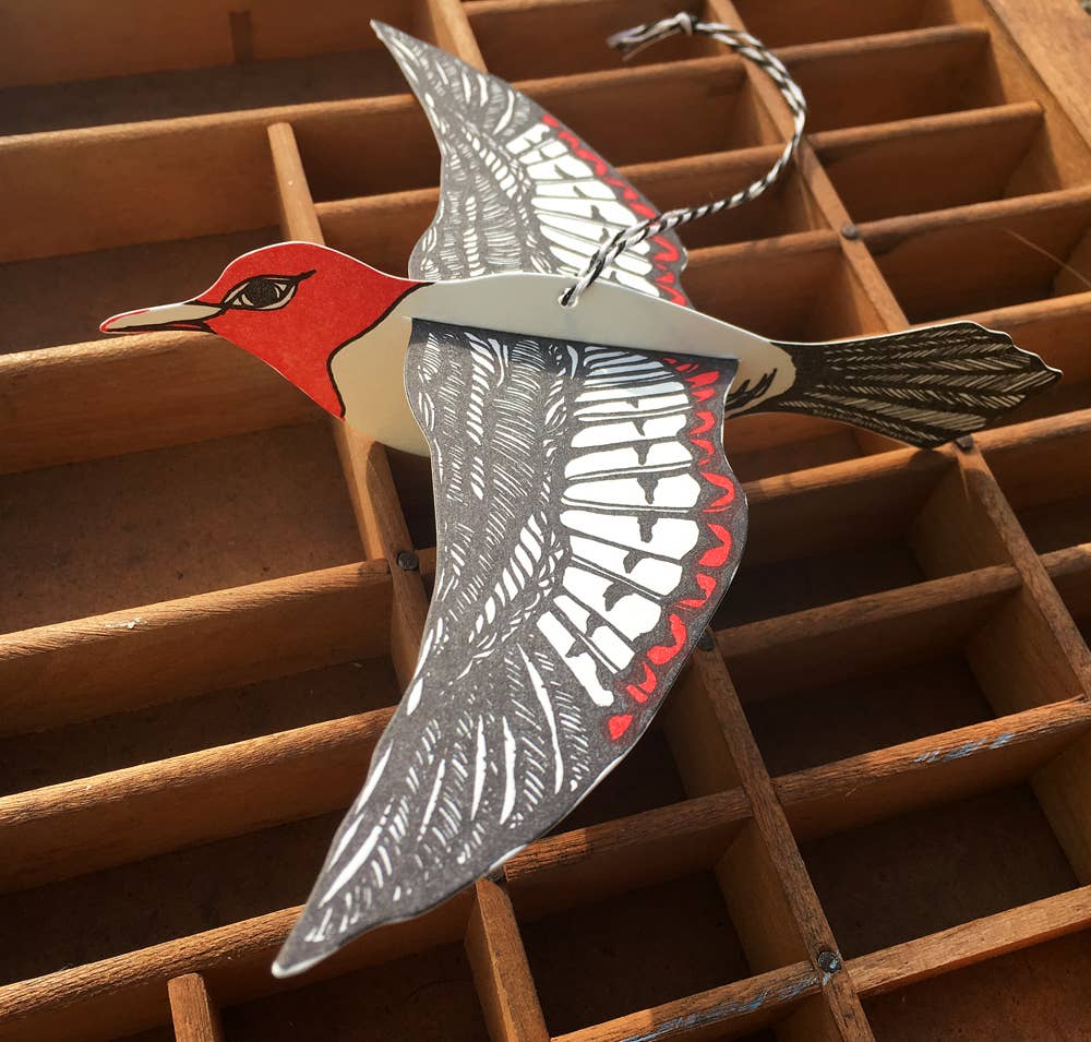 woodpecker pop-out card, redheaded woodpecker card, letterpress bird greeting card, woodpecker symbolism gift, intuition and opportunity card, black and red letterpress, 3d bird paper craft, displayable bird ornament card, cotton paper pop-out card, birthday bird card, woodland bird stationery, artisan letterpress card, blackbird letterpress pop-out bird, rogue & rye nature cards, hanging bird ornament card