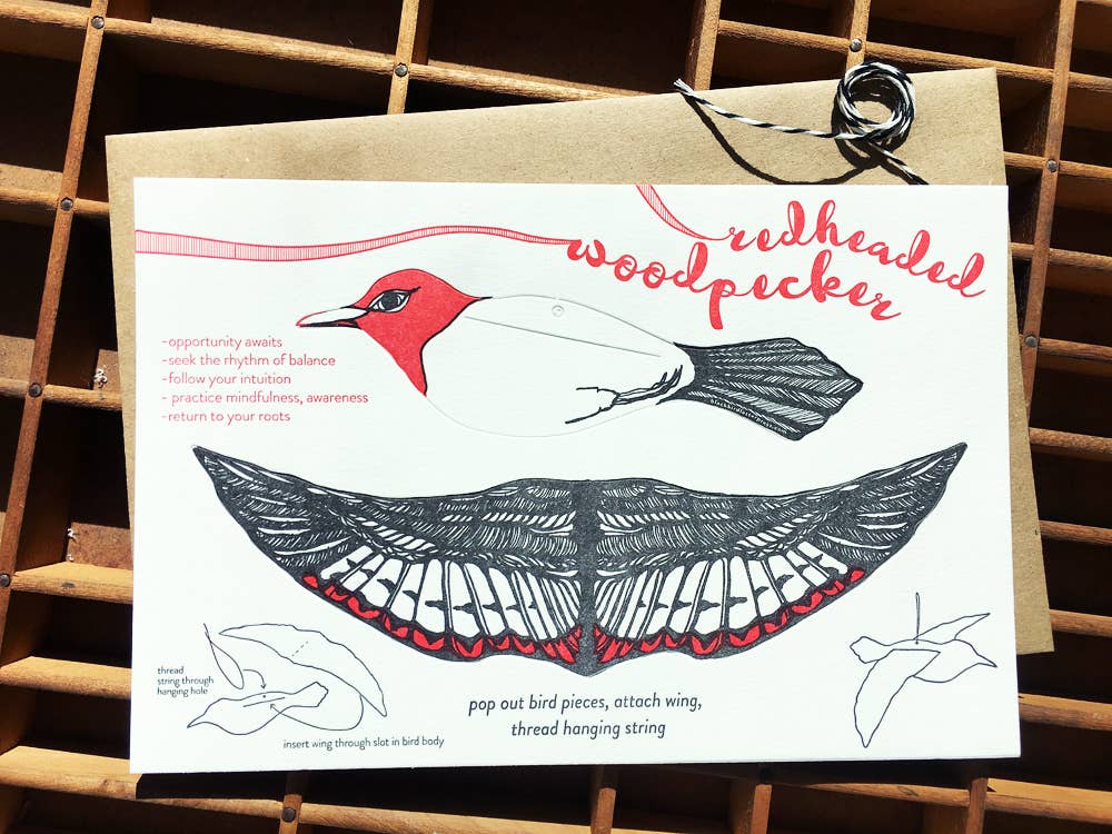 woodpecker pop-out card, redheaded woodpecker card, letterpress bird greeting card, woodpecker symbolism gift, intuition and opportunity card, black and red letterpress, 3d bird paper craft, displayable bird ornament card, cotton paper pop-out card, birthday bird card, woodland bird stationery, artisan letterpress card, blackbird letterpress pop-out bird, rogue & rye nature cards, hanging bird ornament card