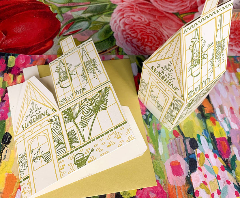 you are pure sunshine card, greenhouse letterpress card, 3d foldable greenhouse card, plant lover greeting card, chartreuse letterpress card, recycled mint paper card, die-cut greenhouse card, buildable paper house, uplifting greeting card, encouragement card, positivity stationery, miniature greenhouse card, artisan letterpress card, Blackbird Letterpress stationery, Rogue & Rye letterpress collection, A2 letterpress greeting card, Élise Lassonde illustration, displayable paper craft card