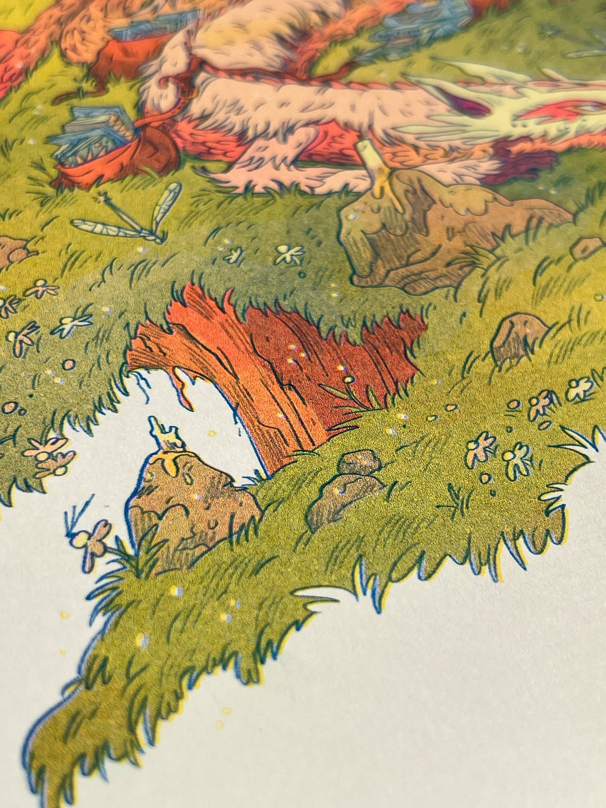 Book Dragon risograph print, Natalie Andrewson riso print, Thought Bubble Comic Festival art, reading dragon illustration, blue yellow fluorescent pink riso, fantasy creature artwork, book lover art print, whimsical dragon illustration, indie printmaker risograph, literary fantasy art, collectible riso print, Rogue & Rye artist collection.