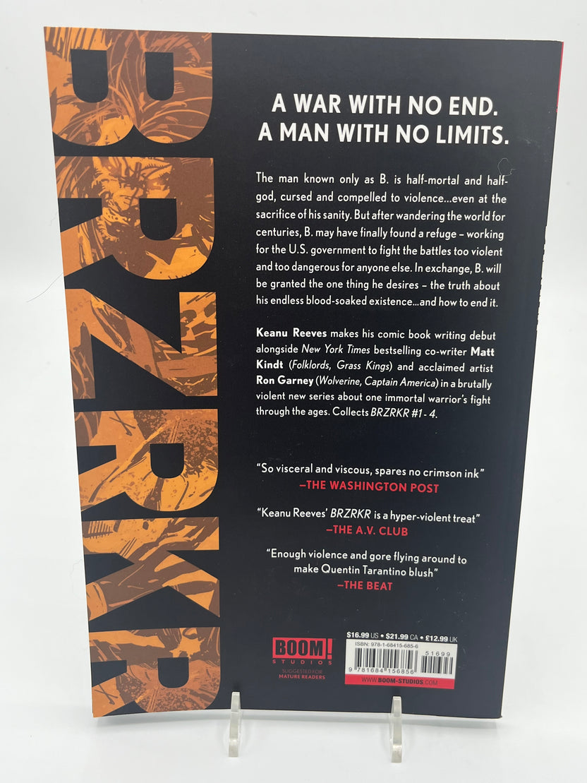 Back cover of BRZRKR Volume One featuring the series synopsis, review quotes, and publisher information from the graphic novel by Keanu Reeves, Matt Kindt, and Ron Garney.