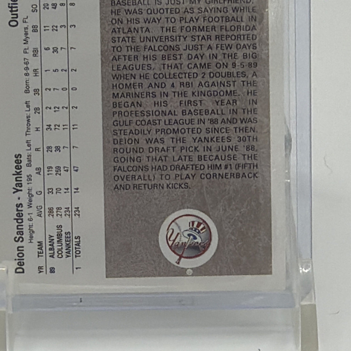 Detail view showing back and condition of Deion Sanders Star Rookie #13 card